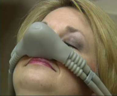 a patient receiving nitrous oxide for emergency dental treatment